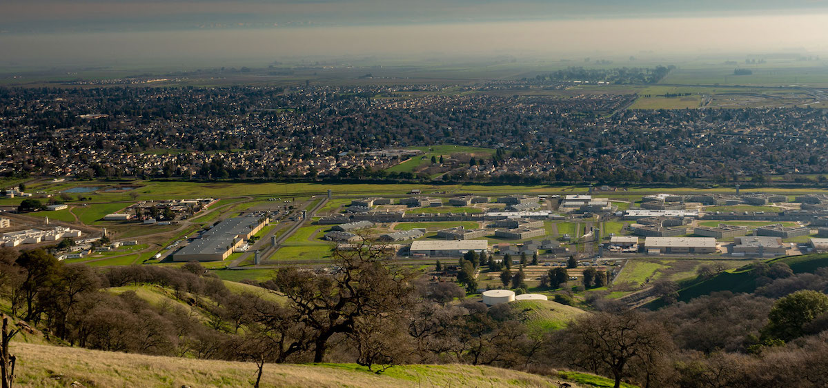 Aerial View of Solano Valley with trees, buildings, and houses