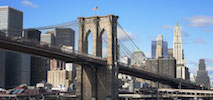 Brooklyn Bridge with a flag on top
